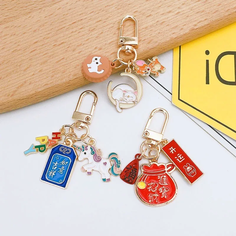 

Alloy drop oil Unicorn transport key chain creative bag Car Key Pendant Gift