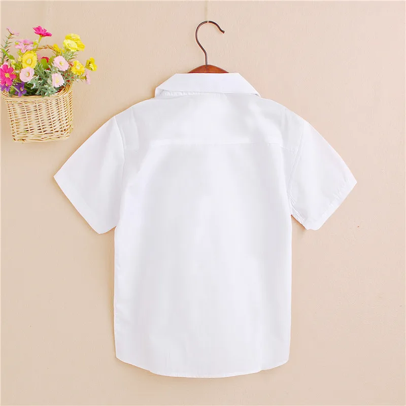 

Children's clothing spring and autumn new style boy white shirt cotton short-sleeved white shirt performance costume