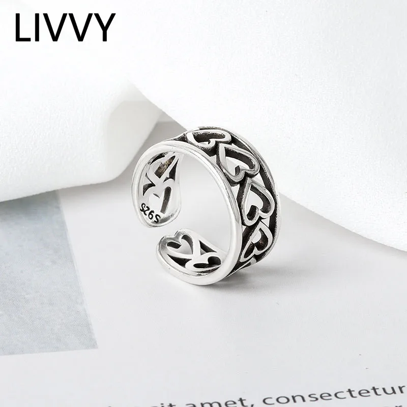 

LIVVY Silver Color Love Heart Hollow Connection Ring Female Fashion Temperament Elegant French Light Luxury Jewelry