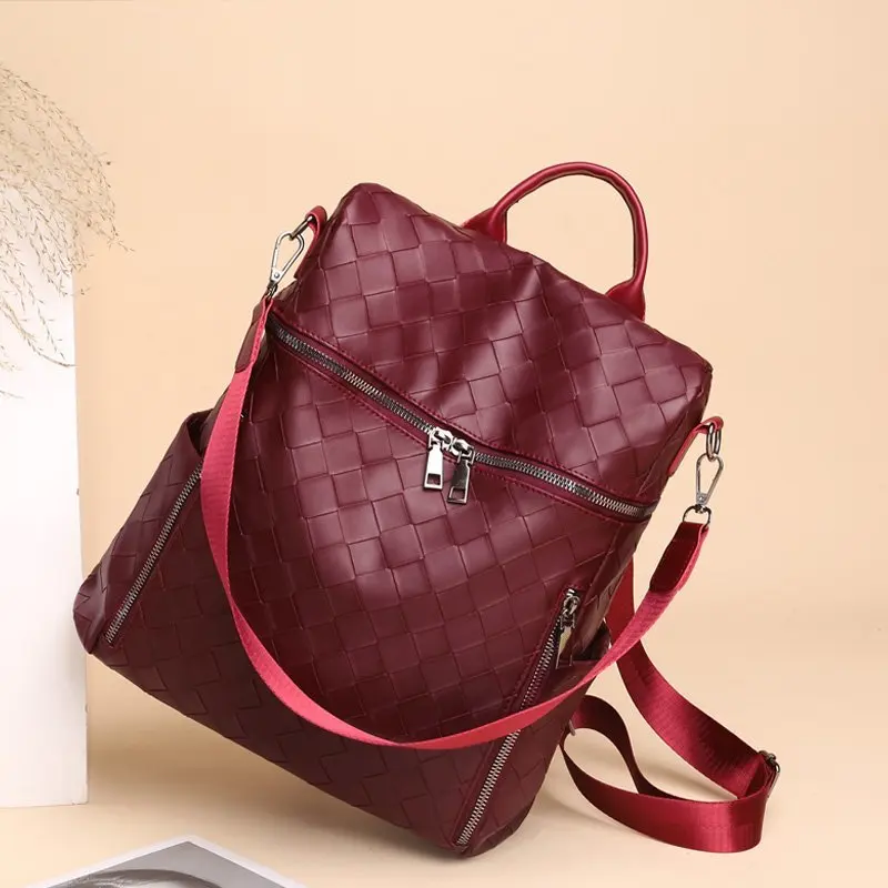 

Brand fashion woven backpack luxury designer young girl school bag 2020 new high quality leather large capacity travel backpack