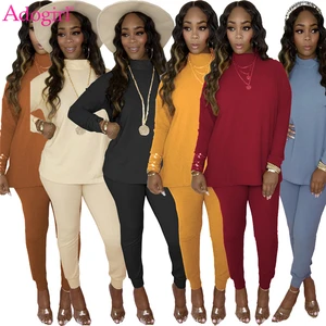 Костюм женский трикотажный в рубчик, с высоким воротником и длинными рукавами