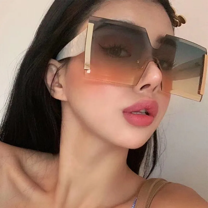 

Солнцезащитные очки без оправы UV400 женские, роскошные брендовые дизайнерские зеркальные сиамские солнечные очки в винтажном стиле, в метал...