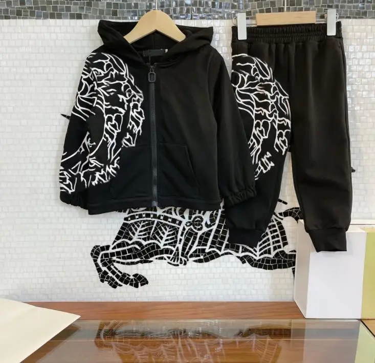 

Boy's black hooded jacket + trousers Kids sports suit
