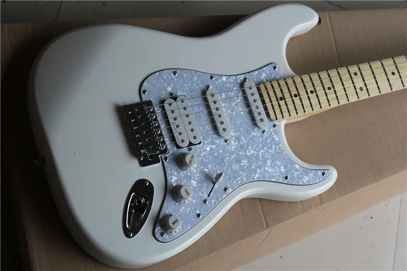 

High quality st electric guitar, white pearl guard, HSS pickup, maple fingerboard. It can be customized according to requirement