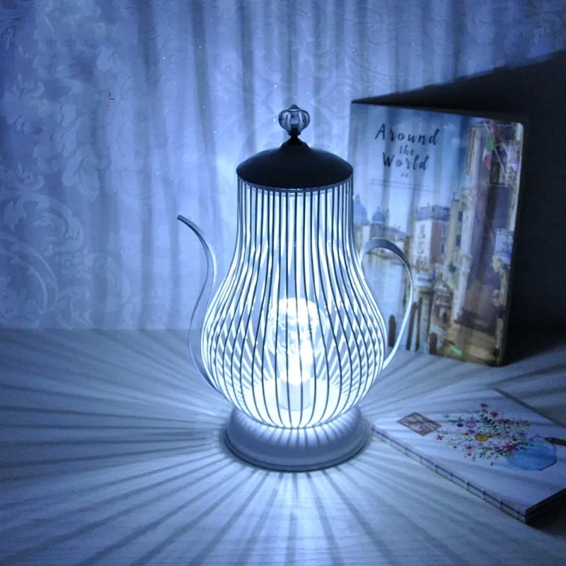 

Exquisite, iron art Teapot LED electronic candlestick Wind lamp decorative lamp