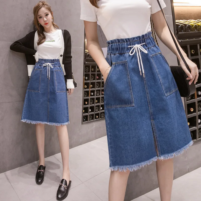 Женская джинсовая юбка на завязках винтажная средней длины с большими карманами