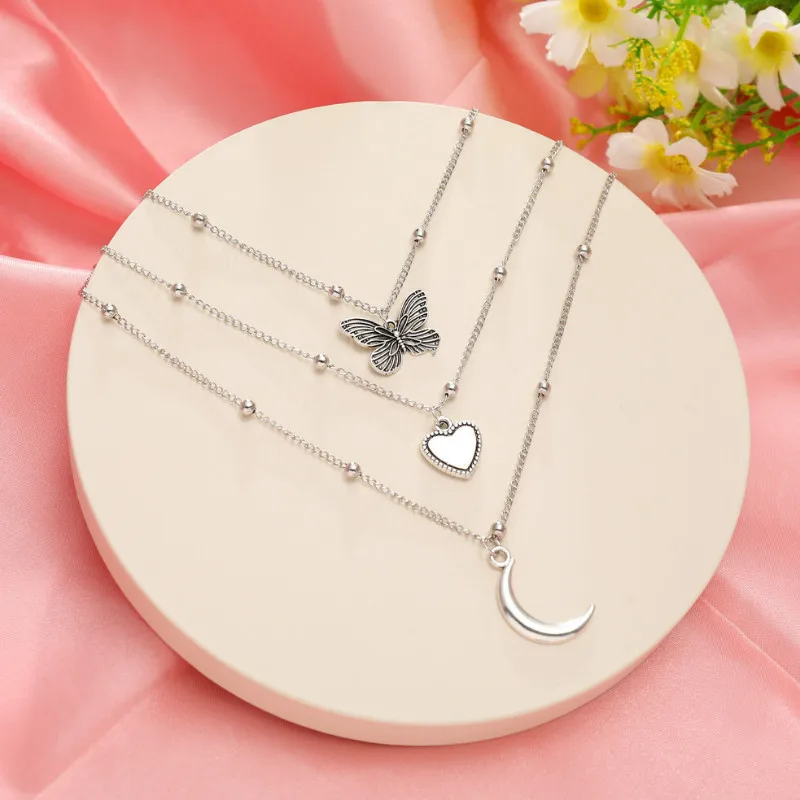 

Simple Trendy Alloy Moon Love Heart Butterfly Pendant Multilayer Necklace Party Jewelry Accessories For Women