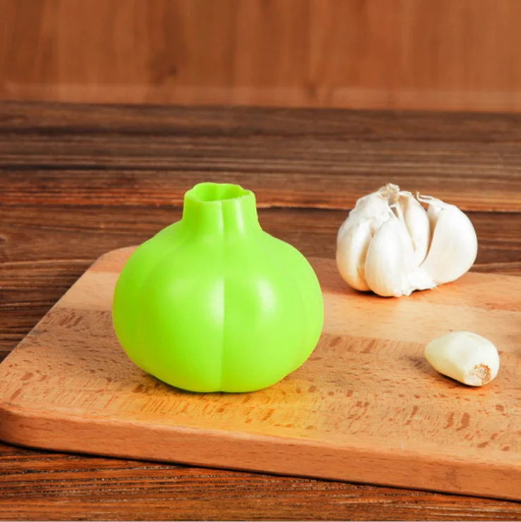 

Household garlic peeler and garlic peeler; food grade manual garlic squeezing device; kitchen silica gel garlic stripper