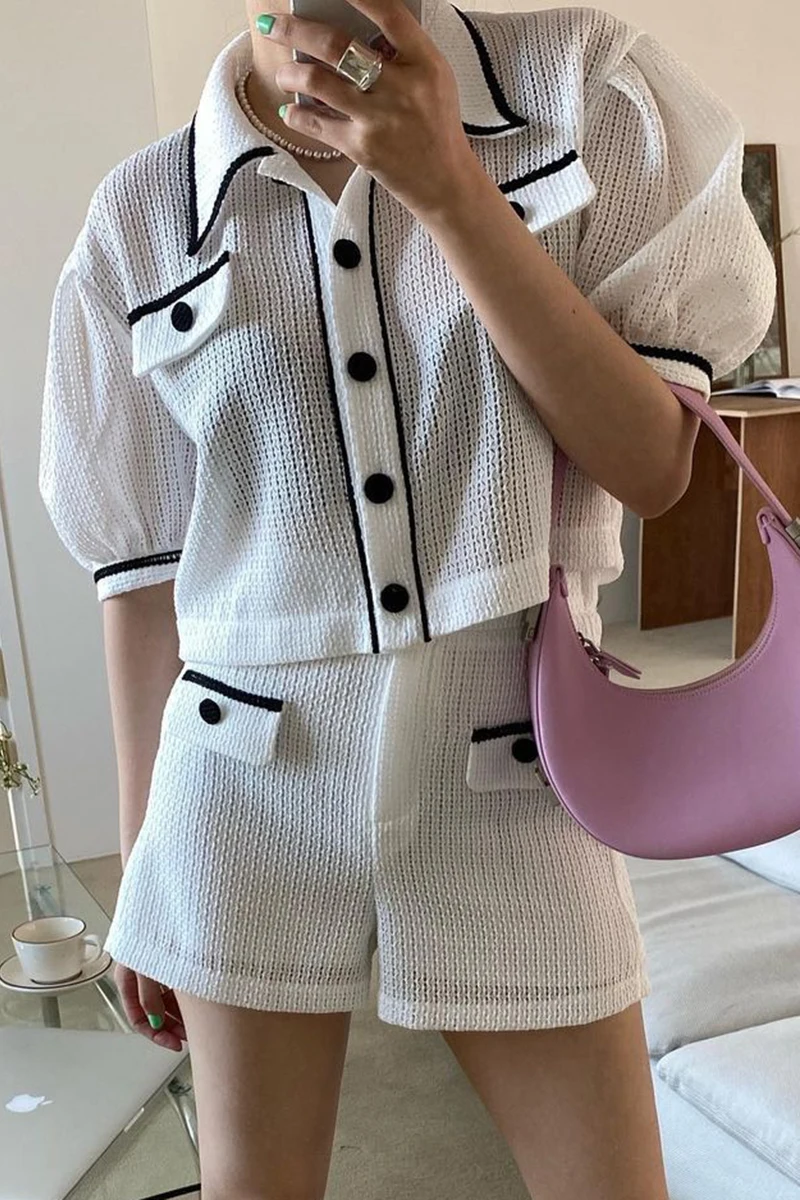 

South Korea ins summer design lapel contrast color single-breasted puff sleeve shirt top + niche high-waist shorts women