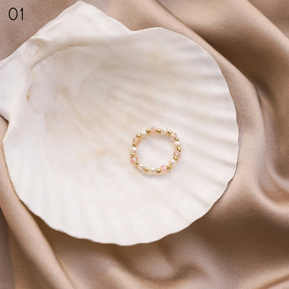 Регулируемый с украшением в виде кристаллов множеством кругов из бисера палец