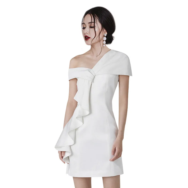 

The star shares a sexy off-the-shoulder leafy skinny dress with a vintage white dress for a spring French girl