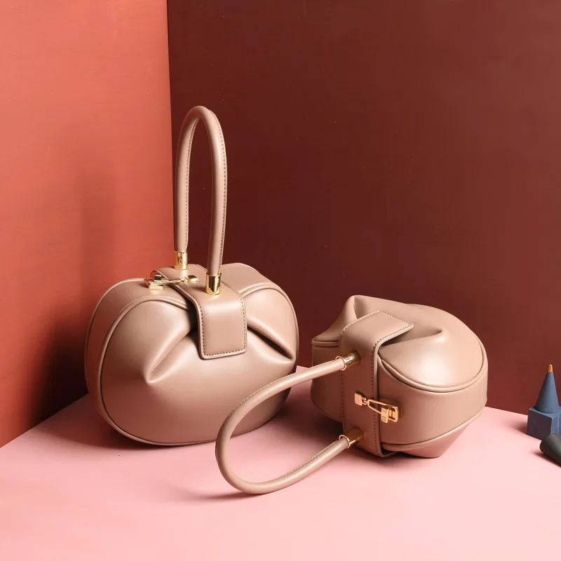 100% genuine leather luxury handbag niche design all-match handbag European and American fashion retro dumpling wonton clutch