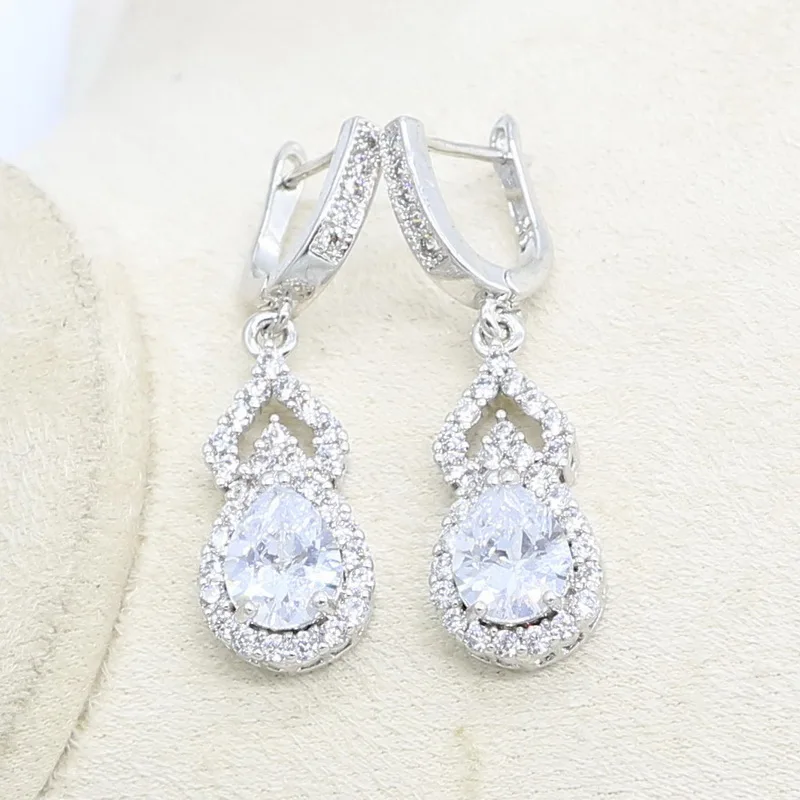 Комплект из кольца и сережек с цирконом серебристого цвета | Украшения