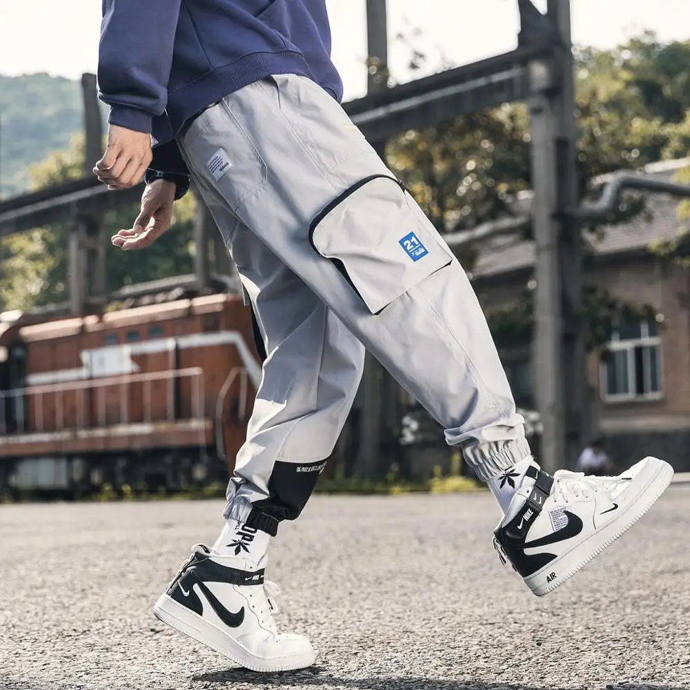 

2020 Men Sweatpants Multi-Pocket Mens Harem Pants Hip Hop Casual Trousers Fashion Loose Cargo Pants Male New Large Size M-5XL
