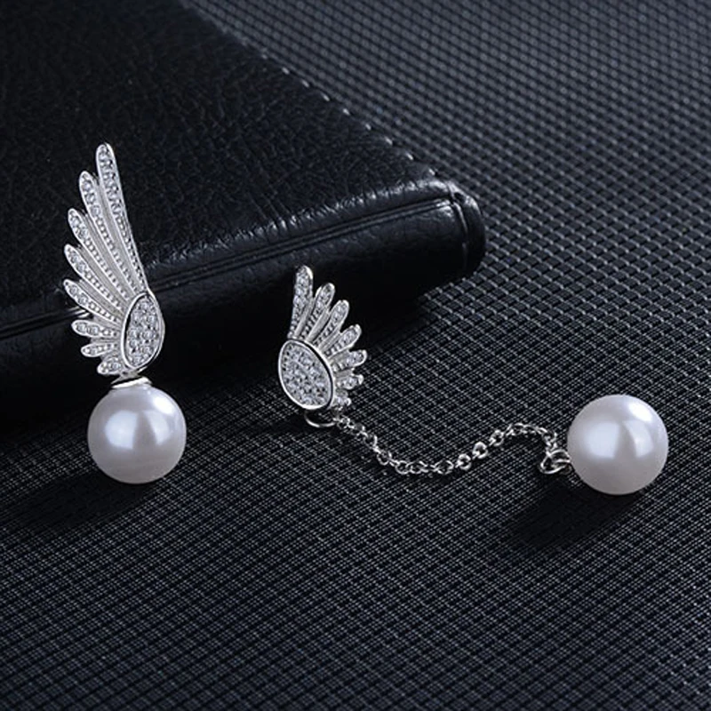 Женские серьги-гвоздики из серебра 925 пробы с двумя ангельскими крыльями |