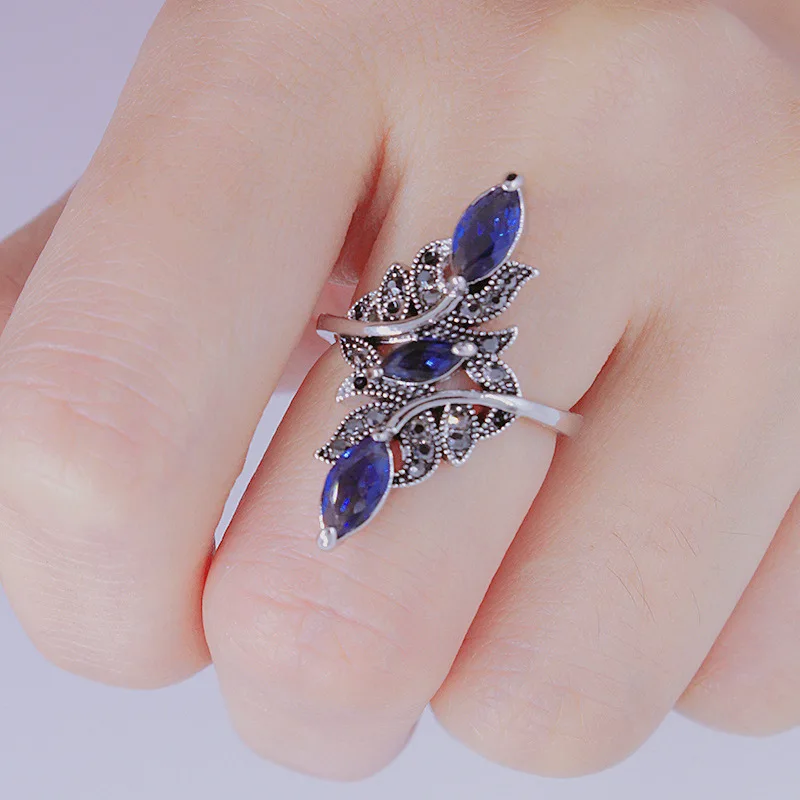 

Milangirl Vintage Silver Color Leaves Shaped Mirco Paved Blue Water Drop Crystal Rhinestone Zircon Female Ring for Women Jewelry