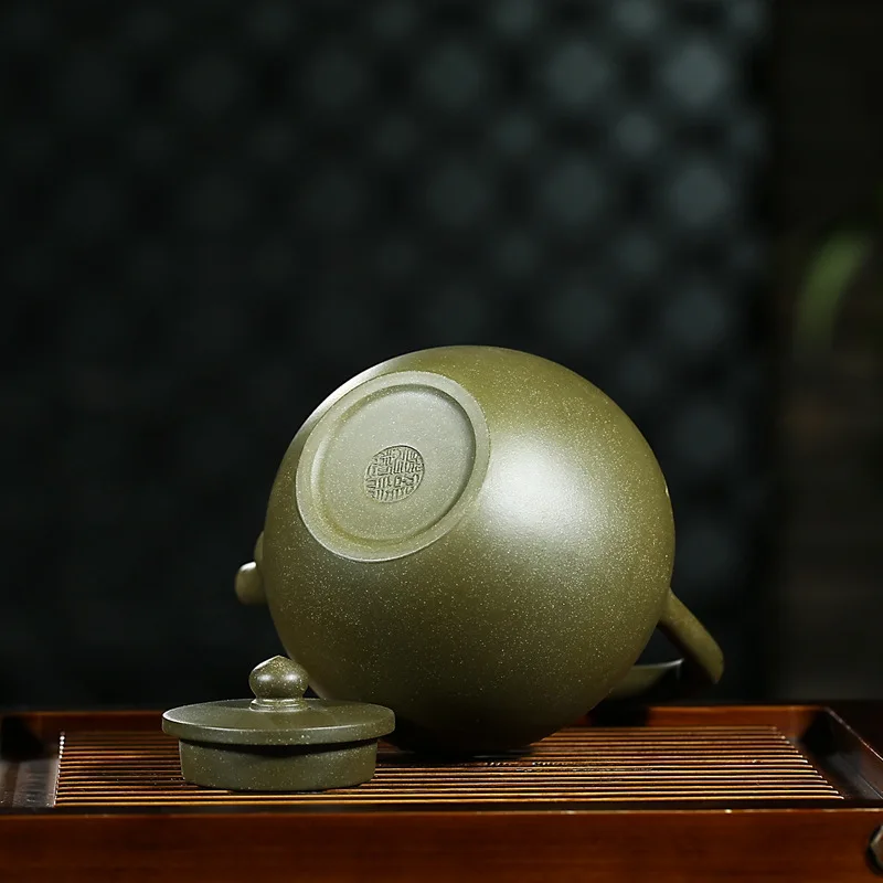 

Raw Ore Dark-red Enameled Pottery Teapot The Republic Of China Green Niwu Sutra Handle Kettle Portable Will Milliliter Teapot