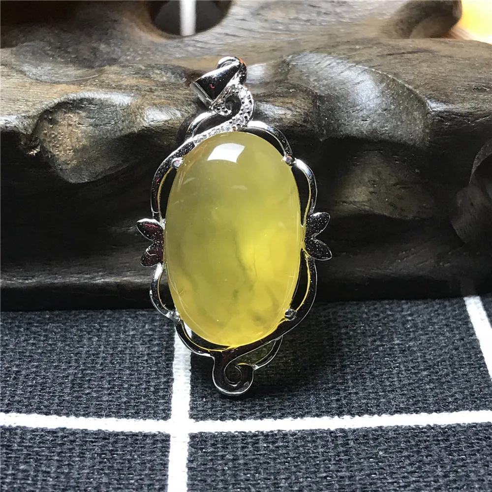 

Подвеска из натурального жёлтого янтаря, 37x21x8 мм