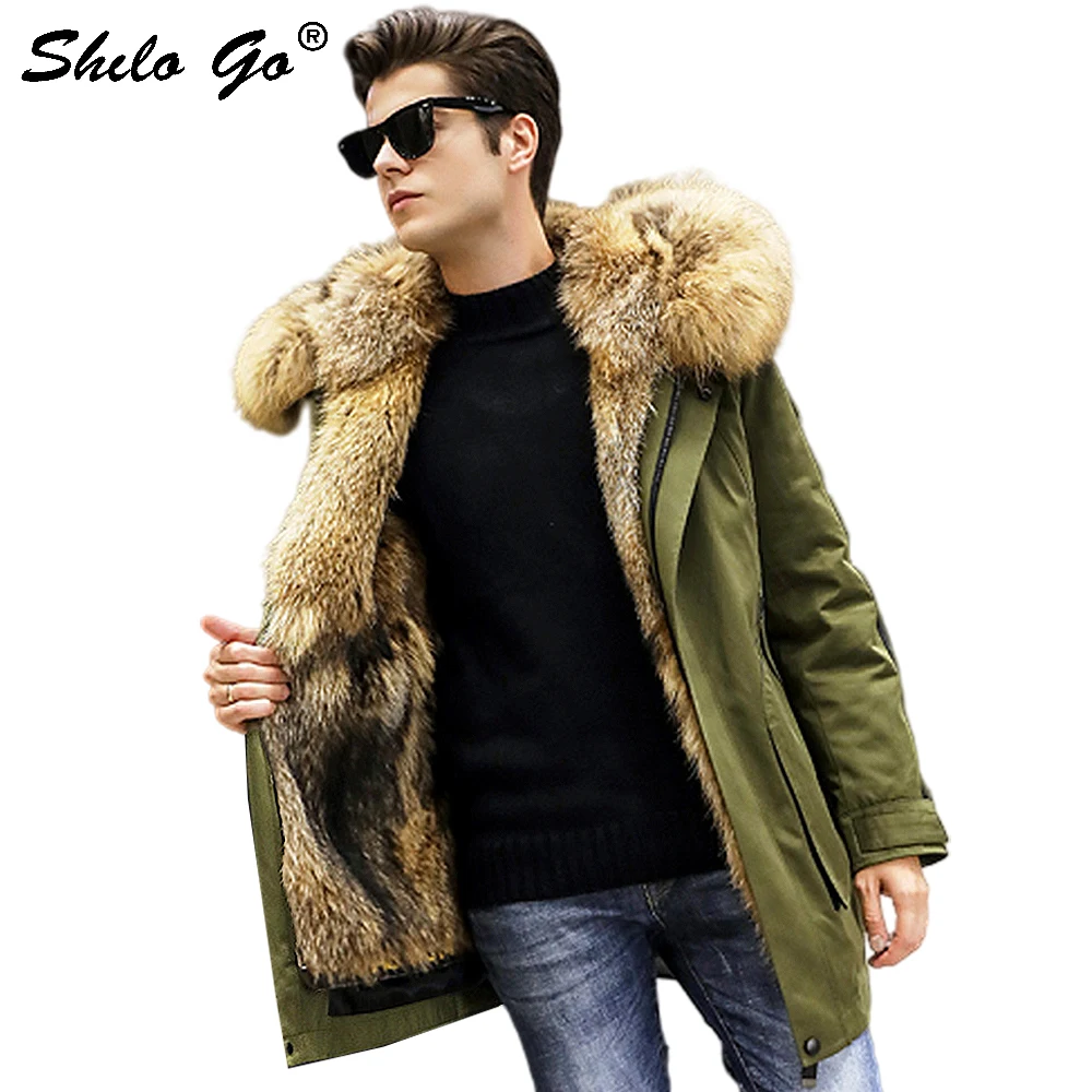 Пальто с мехом в стиле сафари воротник из натурального меха енота и плюкет