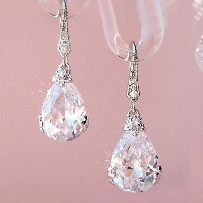 

Huitan New Classic Pear Shape Cubic Zircon Women Wedding Drop Earrings Silver Color High Quality Female Timeless Earring Jewelry