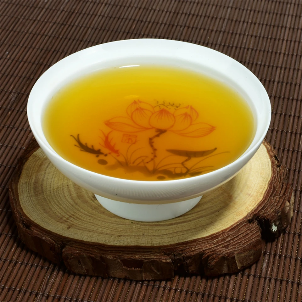 

Chinese Taiwan Milk Oolong Tea Beauty Weight loss Lowering Blood Pressure High Mountains JinXuan Milk Oolong Tea Houeseware