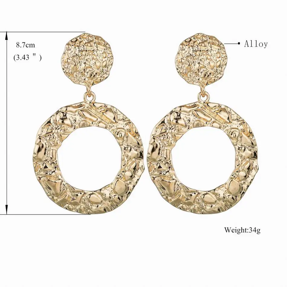 Женские серьги капли с большими кругами золотистые выпуклой текстурой