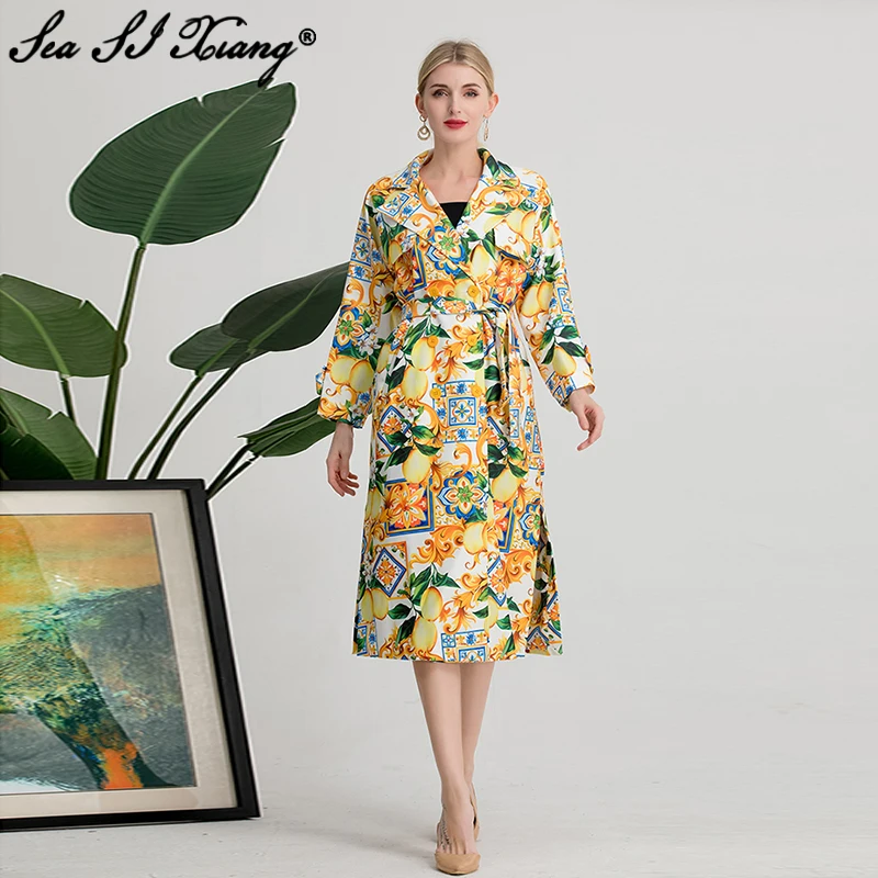 

Тренчкот женский осенний двубортный с отложным воротником и поясом