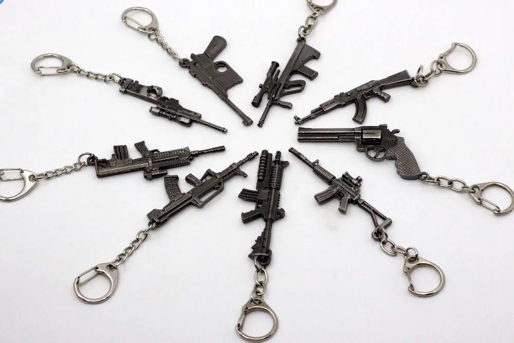 

Hot Sale Game M16 Novelty Items AK47 Men Guns Keychain pendant Trinket M4A1 Sniper Key Chain 10 styles Jewelry Souvenirs Gift