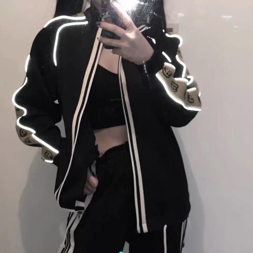 

European and American couples sportswear tide brand reflective strip men's and women's loose coat sports suit