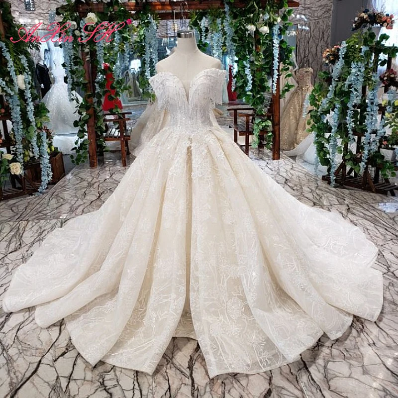 

AnXin SH Luxury princess flower white lace beading crystal illusion boat neck dubai champagne wedding dress 100% real photo11913