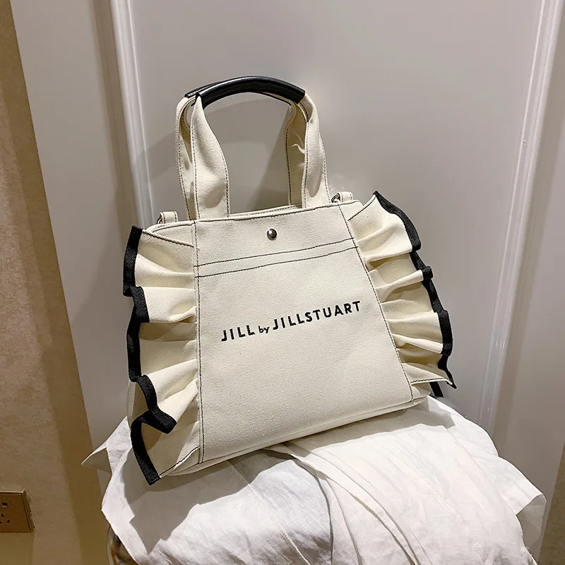 

Холщовая женская сумка в Корейском стиле, вместительная дизайнерская сумочка через плечо с оборками, повседневные большие тоуты для отдыха...