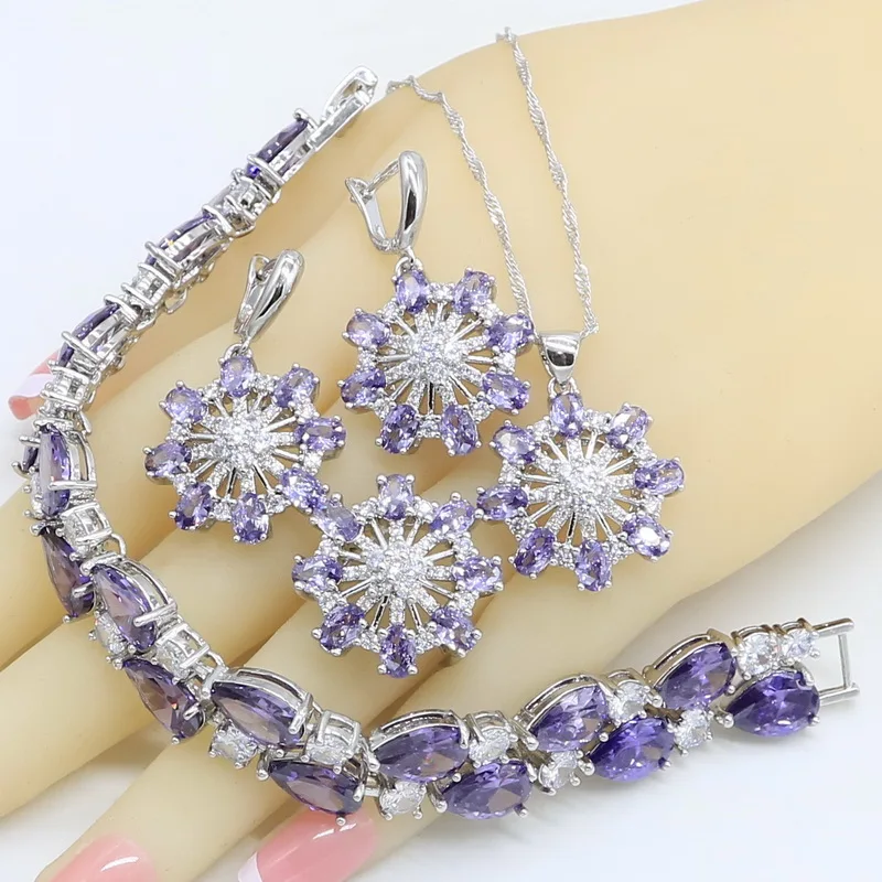Женский комплект украшений серебряного цвета с фиолетовым цирконием вечерние