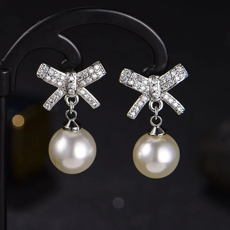 Women's Bowknot Wedding Stud Earrings Shiny Micro Crystal Butterfly Imitation Pearl Elegant Bridal Piercing Earring Jewelry Gift