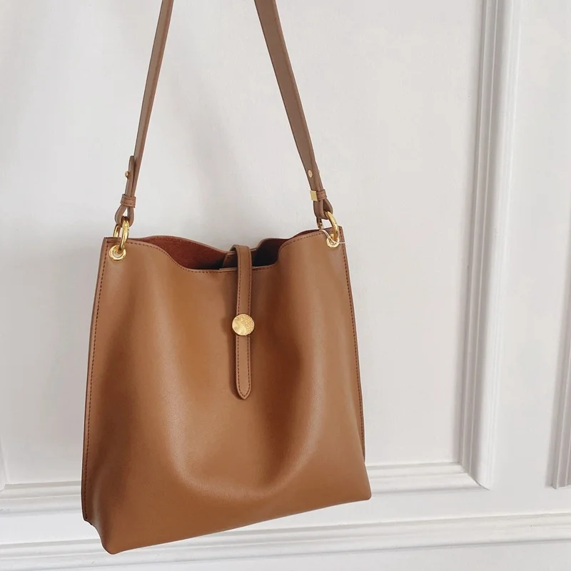 

2021 new leather cowhide bucket bag, versatile and fashionable hand-held slung Korean women's bag