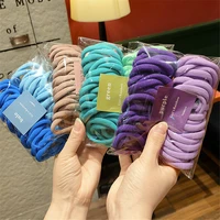 50pcs new fashion women solid color stretch elastic hair bands simple plain rope bands protect the hair 6 colors