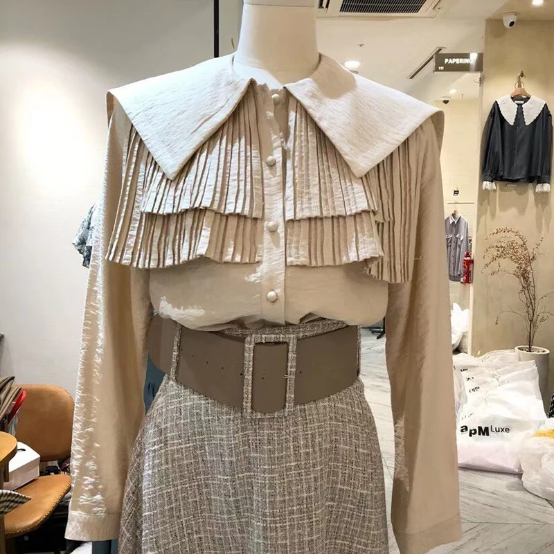 

RUGOD 2020 spring new sweet temperament fresh pure color lapel fold long sleeve shirt blouse women