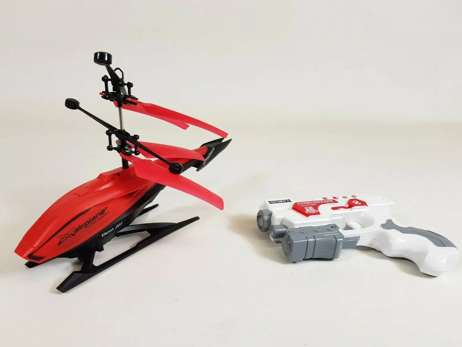 

Летающий лазерный детский игрушечный вертолет с дистанционным управлением Индукционная радиоуправляемая летающая игрушка