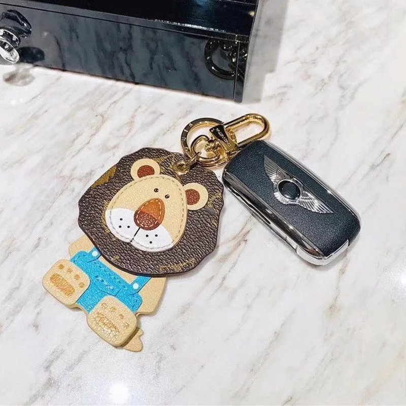 

Trendy Top Leather Bag Charm Cute Lion Key Chain Brand New Old Flower Bag Pendant Car Ornament Woman Accessory Hot Sale Top Gift