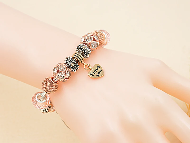 Женский браслет с бусинами и кристаллами золотистого цвета|Браслеты шармами| |