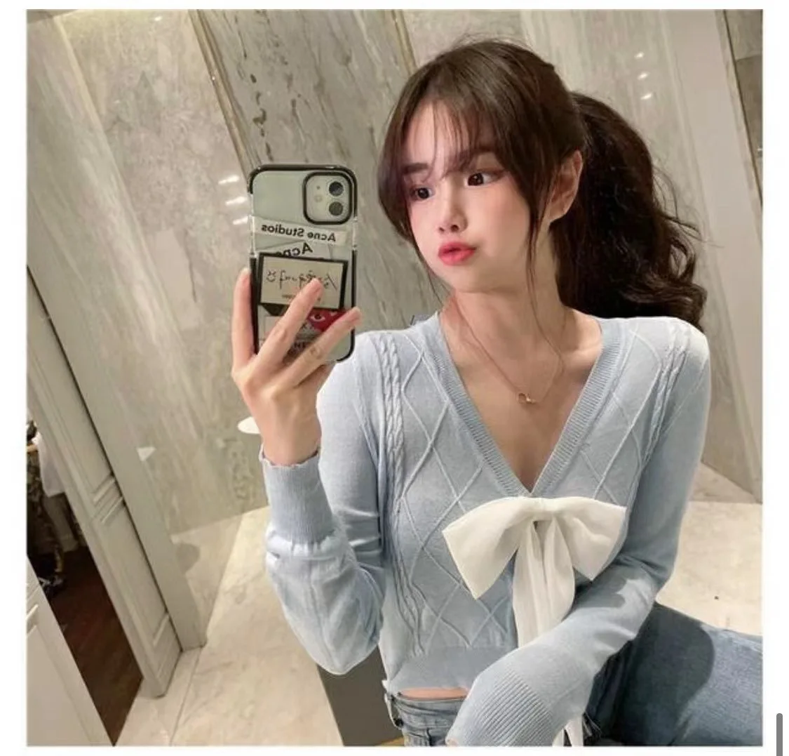 

New han edition female design feeling bowknot knitting cardigan coat brief paragraph long-sleeved v-neck sweater
