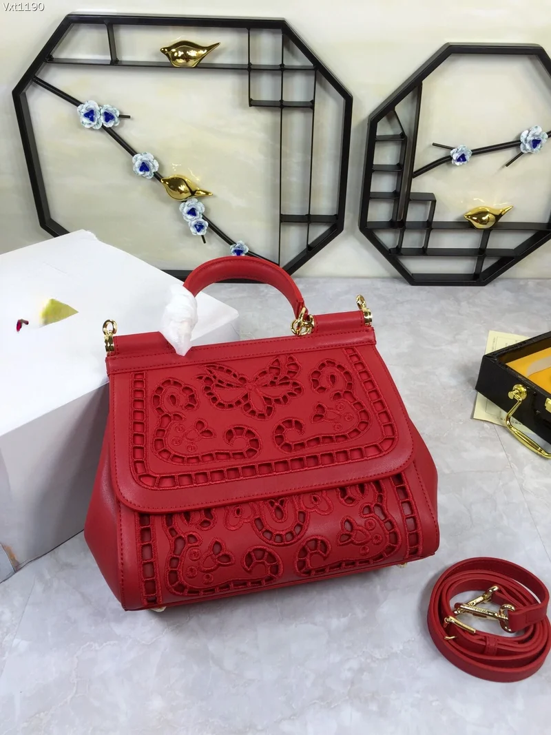 

2021 hollowed out carved surface pattern high quality leather designer women's portable Shoulder Bag Handbag