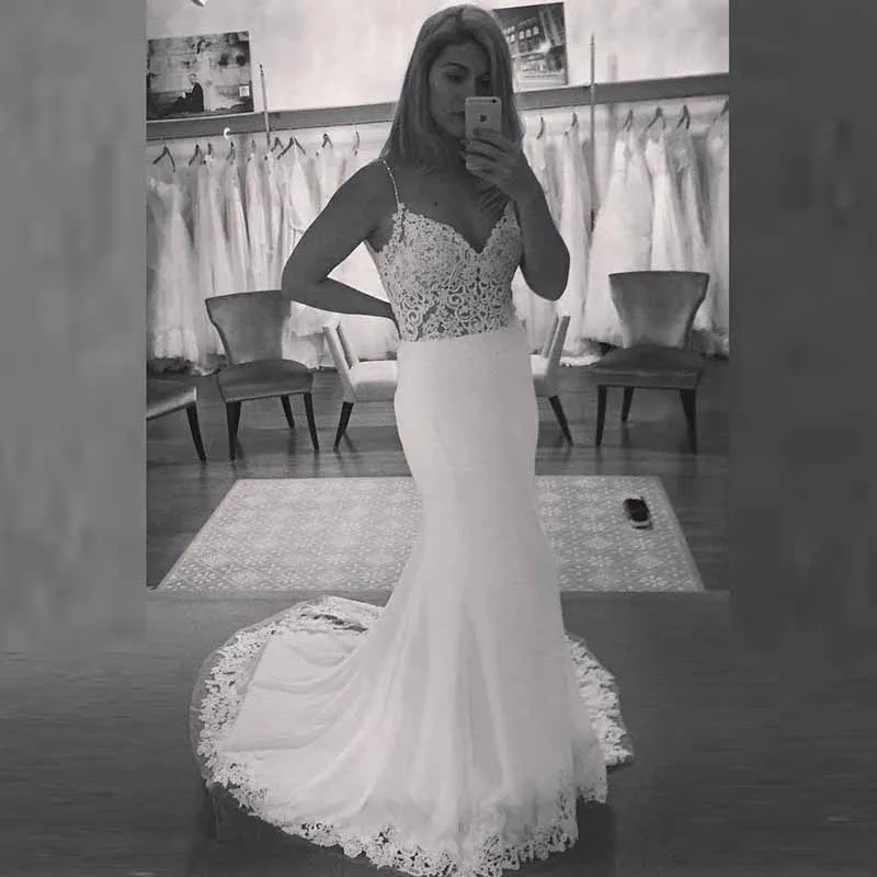 

Hot Sale Elegant White Lace Mermaid Bridal Wedding Dresses Backless Spaghetti Strap Wedding Gowns for Bride Deep V Neck Applique