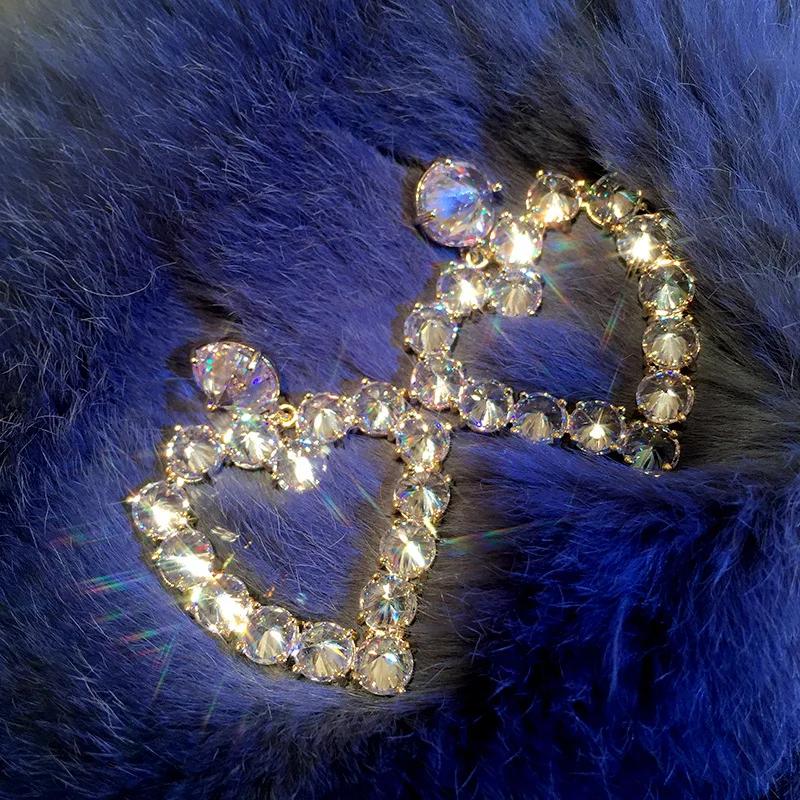 

Exaggerated micro-inlaid red large zircon love heart tassel heart earrings