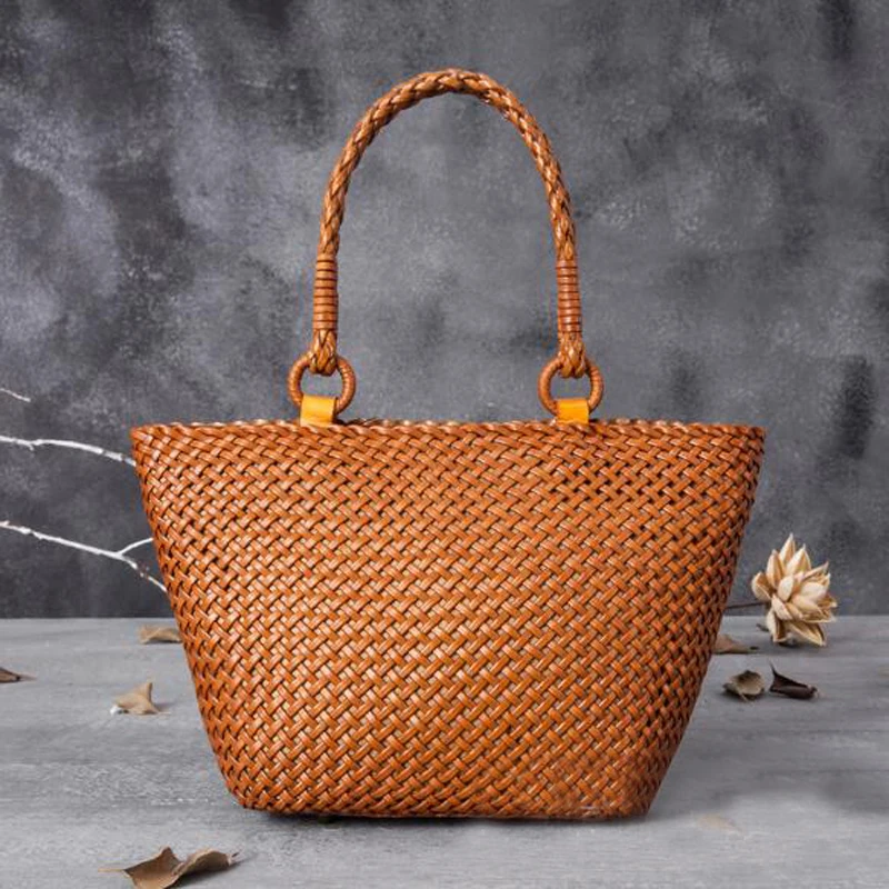 

Vintage Female Travel Beach Bag Hot Sale Leather Weave Handbag Women Basket Bags Cowhide Leather Knitting Basket Casual Tote