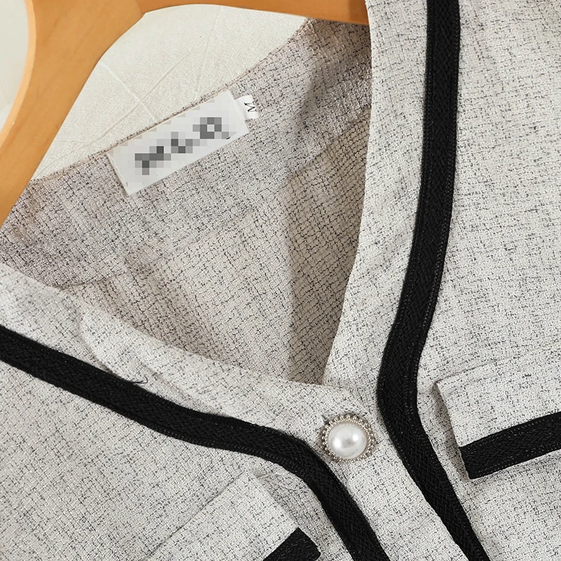 

2021 Summer New Temperament Fashion Suit Loose Short V-neck Top and Hip Skirt Two-piece Summer Suit GL547