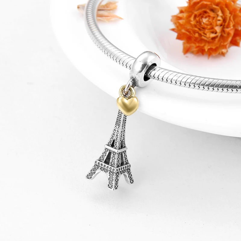 Подвеска в виде Эйфелевой башни с золотым сердцем серебро 925 пробы | Украшения и