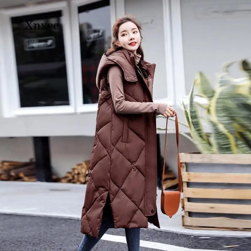 

Женская теплая куртка, новинка, зимний длинный жилет, женский пуховик из хлопка, Корейская версия свободного покроя, модный жилет с капюшоном, одежда