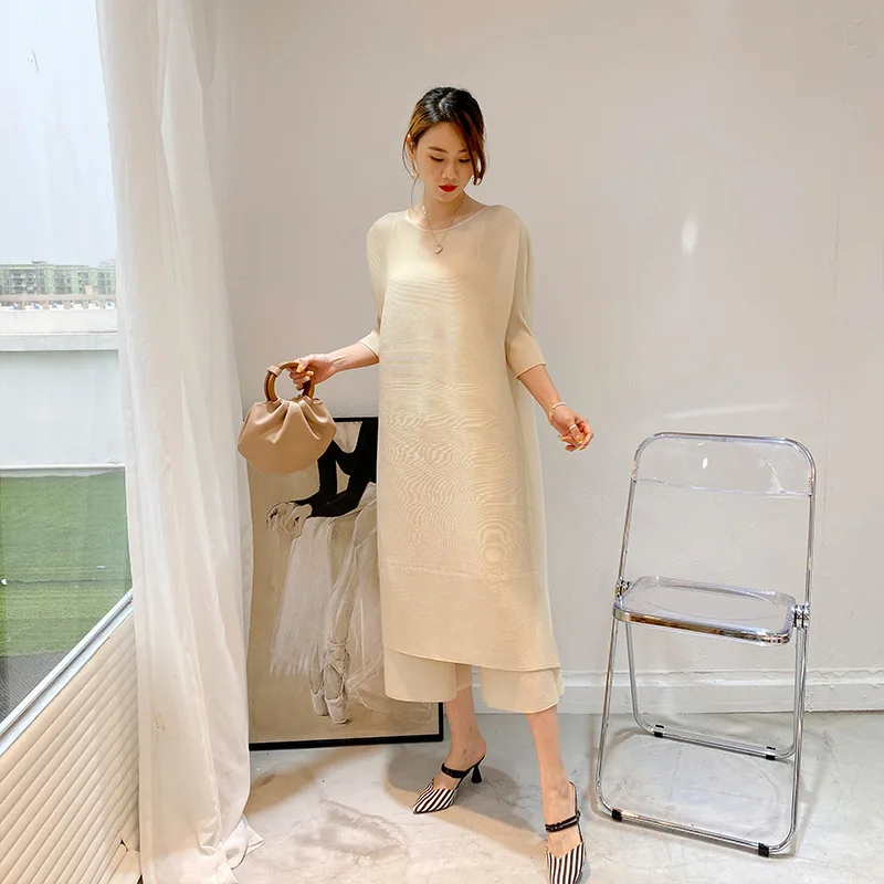 

Dress Suit Women Summer 2021 New Solid Color Stretch Loose Miyake Pleated Two Piece Set Round Neck Dress + Wide Leg Trousers
