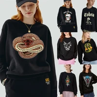 womens clothing pullover black long sleeved sweatshirt street trend cobra print round neck casual autumn warm commuter soft top