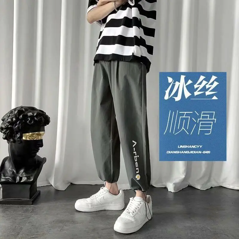 

Pants men's summer thin quick drying pants men's drawstring casual pants loose nine point Korean fashion brand